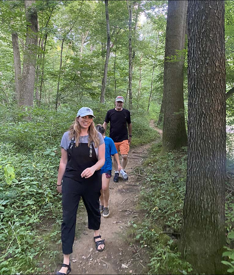 earth-day-planting-2022 Family hike in woods
